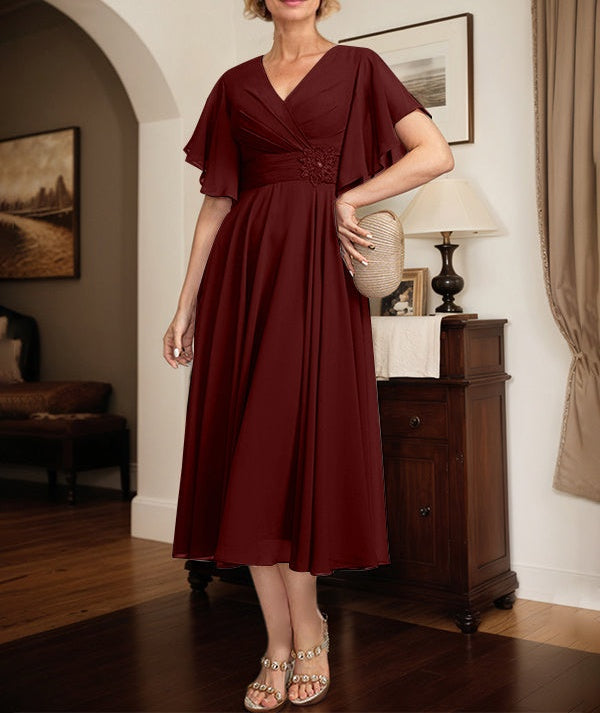A-line V-Neck Tea-Length Chiffon Mother of the Bride Dress With Pleated Beading